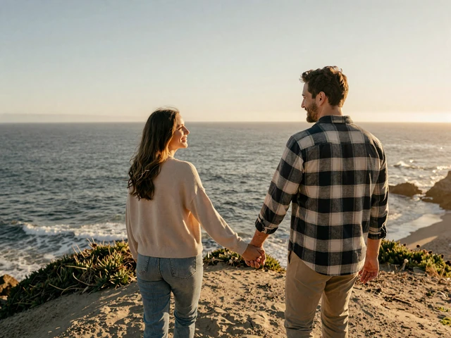 Couple holding hands at a Malibu coastal overlook at sunset, representing trucker dating success in Los Angeles